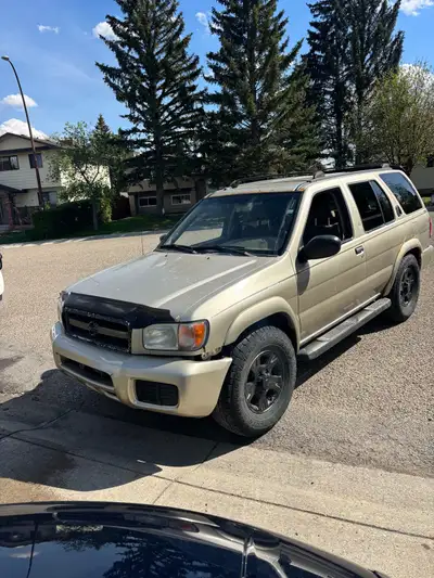 I'm selling my 2003 Nissan Pathfinder, a reliable SUV with a sturdy build, perfect for both city dri...