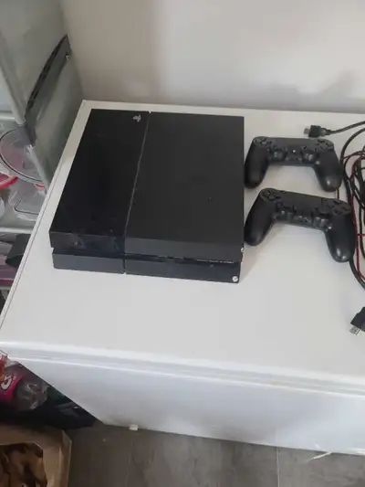 My sonS PS4 1tb with 2 controllers and 500gb hardrive, View more