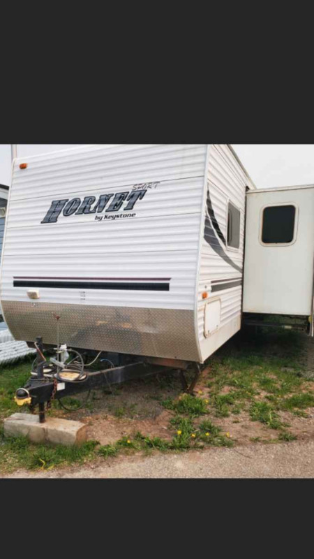 FREE REMOVAL:   TRAVEL TRAILERS,  MOBILES,  /    RVs HAULED AWAY in Houses for Sale in Red Deer