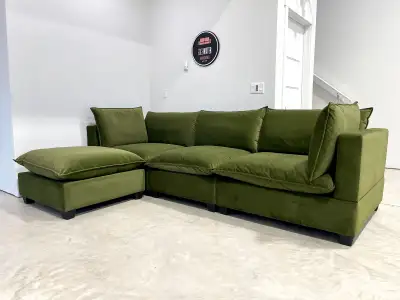 Brand new in box reversible modular cloud-style sectional couch. Solid wood frame with soft, down-fi...