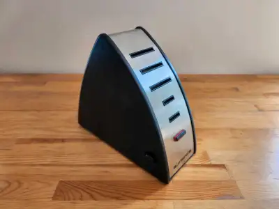An angled design. Features several slots. Has a lock button. It is a great addition for anyone who w...