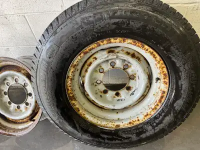 I am selling a set of Ford Econoline heavy duty steel rims fitted with Michelin LTX Winter tires siz...