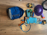 Children’s exercise and toys in back pack,  scooter, and clothes