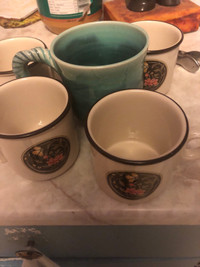 4 Wedgewood smaller size & one regular Cup
