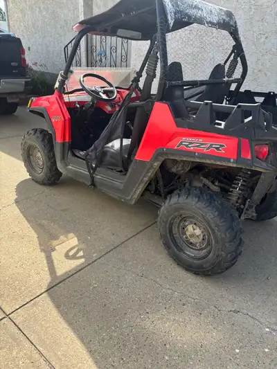 2012 RZR 800 HO. Comes with a 6000lb winch. Power steering assist. 1/2 windshield. Has only 1611 km....