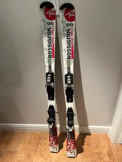 Ski Rossignol Pro 130 with poles , View more