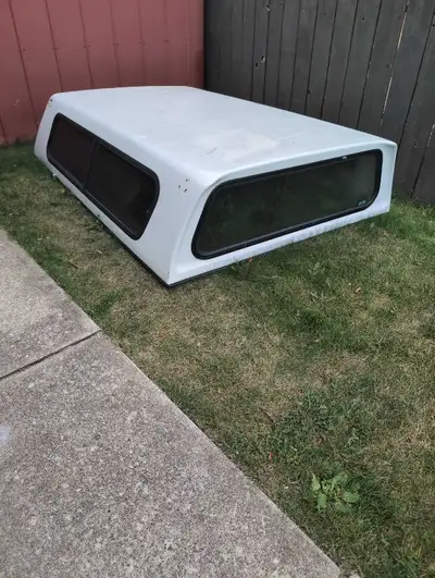 1 White truck topper off a 2013 GMC long box, excellent condition all windows are there no cracks FR...