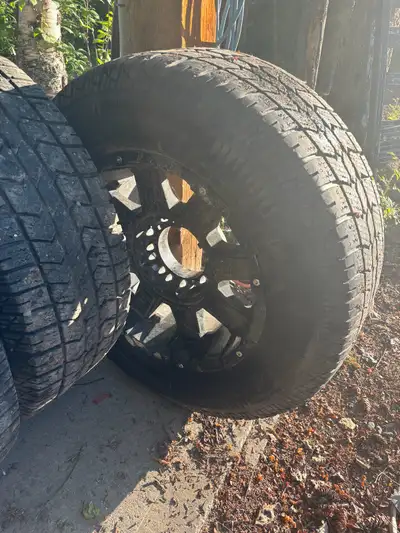 275/65R18 multi fit 8/170 8/6.5 18x10 black wheels winter tires have a season left, one rim 8/170 ho...
