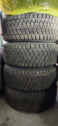 Set of 265 65 r17 Bridgestone Blizzak DM-V2 Tires On Rims