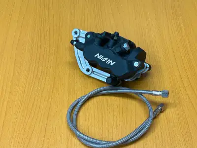 This is an up-grade for the front brake master caliper. Stainless steel hoes, fittings, copper washe...