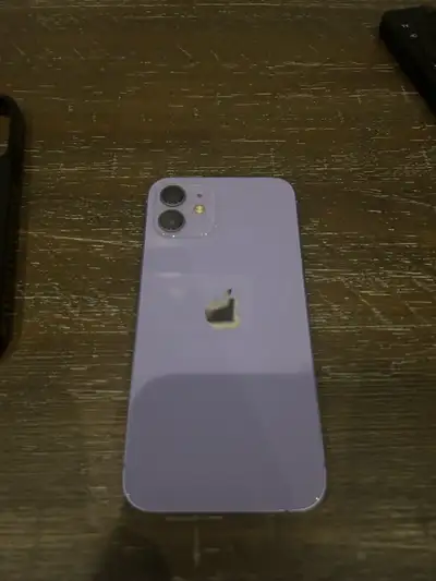 For sale is a very mint condition lilac iPhone 12 64GB unlocked. No scratches or dents anywhere and...
