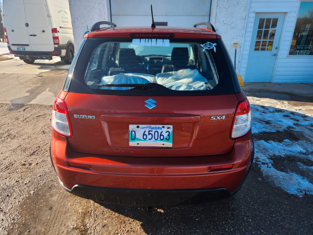 2009 Suzuki SX4 REBUILT TITLE Safety great car! in Cars & Trucks in Winnipeg - Image 4