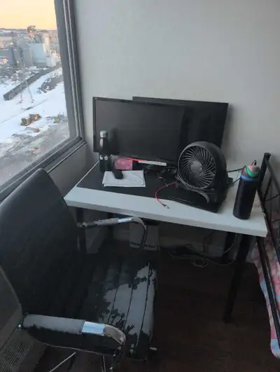 table and chair and power bar and fan , View more