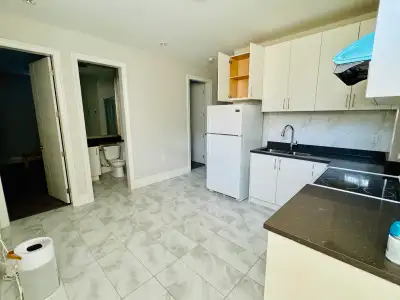 Spacious semi-basement suite featuring 2 bedrooms, 1 living room, and 1 bathroom. Utilities included...