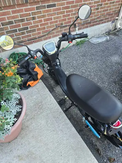 Brand new memory ebike with all accessories. 3000 firm. Must see 2 helmets, cover, lithium charger s...
