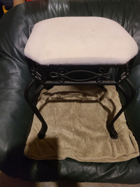 Ottoman with wrought iron legs