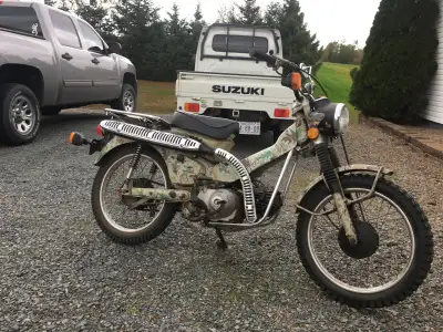 1980 Honda 110 street and trail , has quick release, folding handlebars, design for towing on back o...