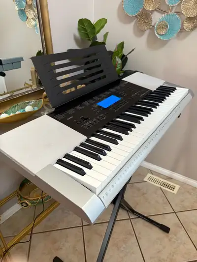 PIANO KEYBOARD WITH ADVANCED FEATURES IN EXCELLENT CONDITION , View more