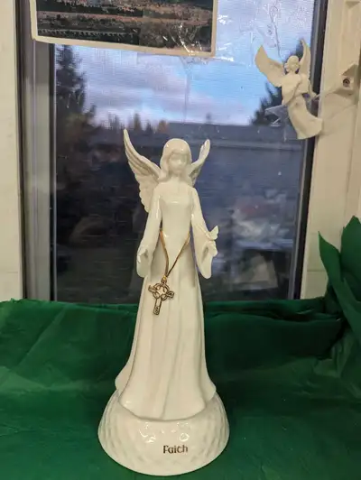 New Angel with a Cross and a Dove on its arm, View more