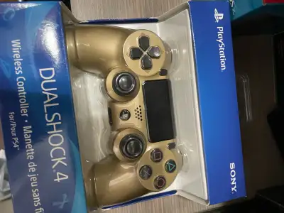 Level up your gaming setup with this authentic gold Sony DualShock 4 wireless controller, featuring...