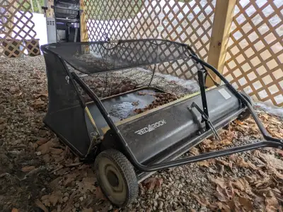 1 year old 48 inch red rock lawnsweeper for sale, brushes are in like new condition. identical to pr...