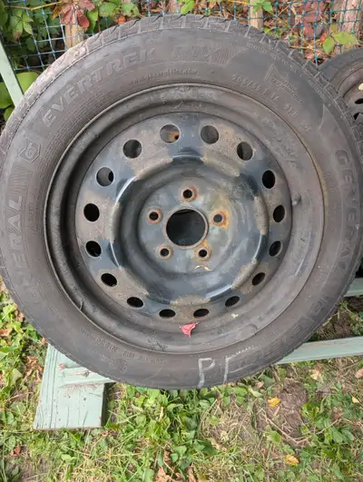 4 Rims off a 2010 Mazda 3 - 5 X 114.3. Summer tires (205/55/16) are currently on the rims but the ti...
