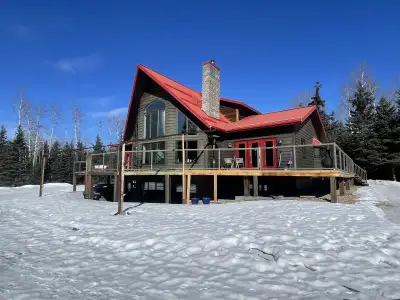 House is custom storey and a half walkout home is situated on 5.07 acres just minutes south of Meado...