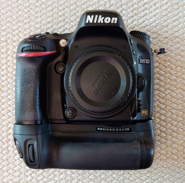 Nikon D610 with a grip in Cameras & Camcorders in Red Deer