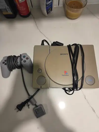 playstation 1. ps1 with controller and cords, View more
