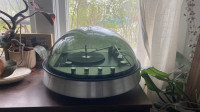 Vintage Silvertone bubble-dome record player with speakers