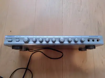 Model Famous Karaoke KM-1000. Has three wired microphone inputs with separate volume adjustment for...