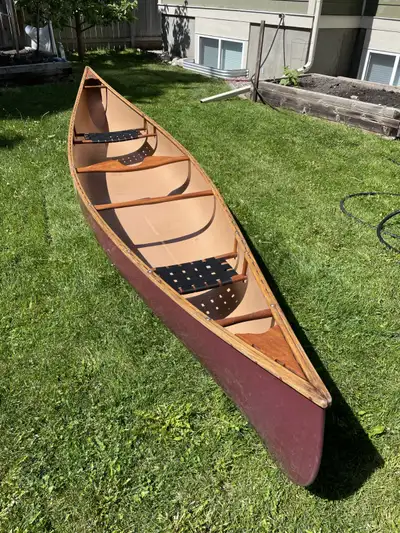 Kevlar-reinforced fiberglass Prospector canoe - made by Evergreen, wood gunwales, thwart, deck and y...