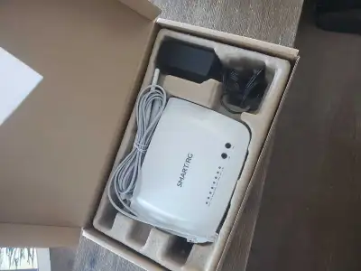 I am selling a used SmartRG modem router, perfect for providing reliable internet connectivity. This...