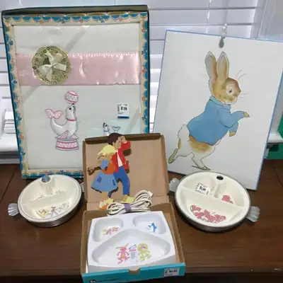 Selling as a set, collection of vintage baby decor. Includes 3 dishes, a blanket, Peter Rabbit wall...