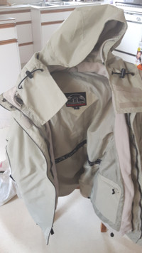 Men's med/large Storm-Tech waterproof jacket.