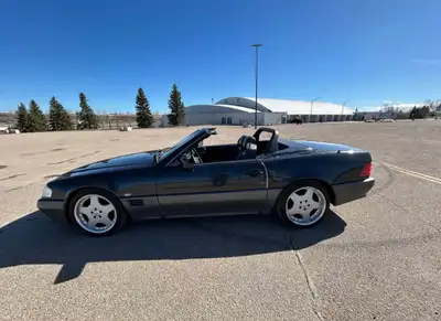 "1991 Mercedes 500SL V8 roadster - 167,000km, 5.0L V8 engine RWD 4-speed automatic Leather interior...