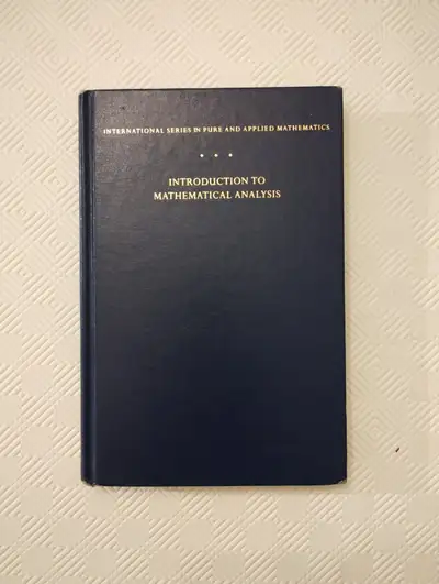A classic university level math textbook. Authors William Parzynski and Philip Zipse. The book itsel...