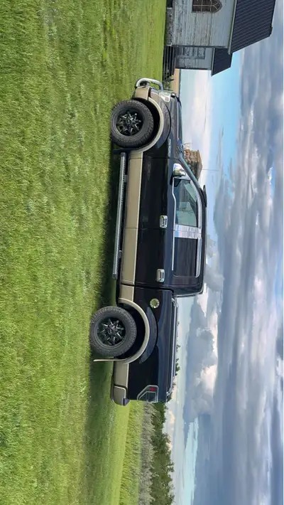 I am selling my rims and tires. They are 275/60R20. They have wrangler duratracs on them that have a...