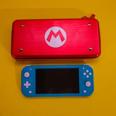 Switch Lite Turquoise + Case, View more