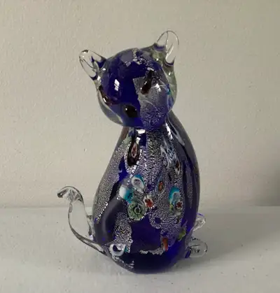 This is a Murano style blue art glass cat figurine featuring millefiore inclusions and embedded silv...