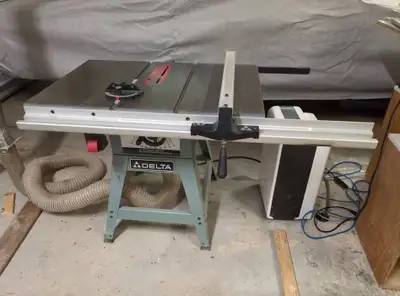 Good condition. Lightly used in heated/climate controlled shop. Saw, fence, and miter jig included....