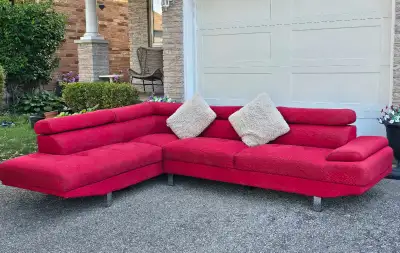 Red sectional couch with adjustable headrest, View more