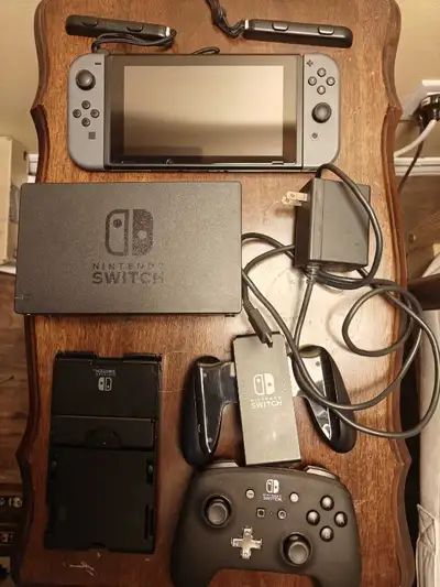 Nintendo switch + controller, View more