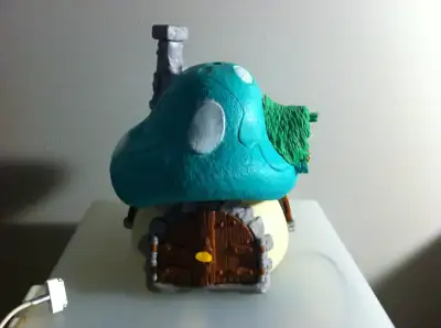 It is one of the variations of large Smurf house with green rooftop. The color of rooftop is light g...