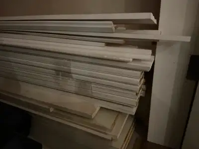 Several brand new wood door & window moulding and baseboards. Bought for basement and was never used...