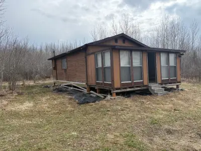 Insulated cabin with porch. 24' x 30' with a 10' x 24' porch. 2 bedroom, 1 bath, full kitchen. Post...