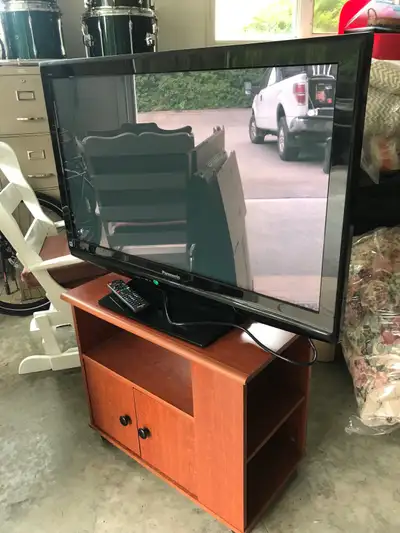 40” Panasonic tv with remote and tv stand. In Terrace BC.