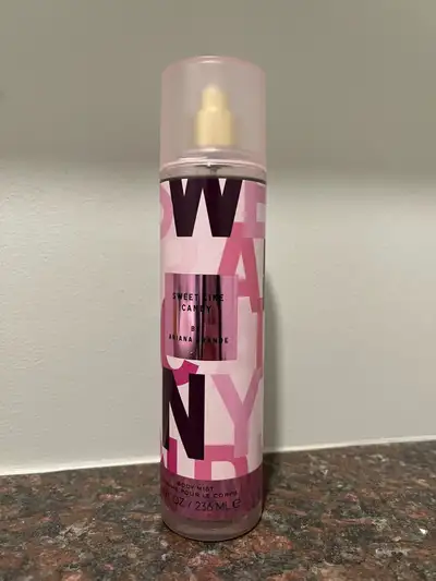 Almost full bottle of Ariana Grande's Sweet Like Candy body spray. Only used a few times to test.