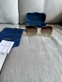 Gucci Sunglasses ($100)