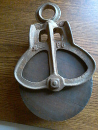 Antique wood and cast iron pulley  (6") in ex. Orig. condition.
